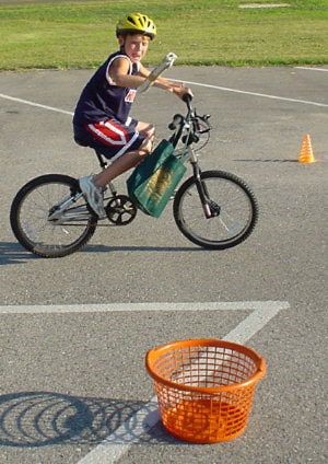 Boy playing on a bike birthday party